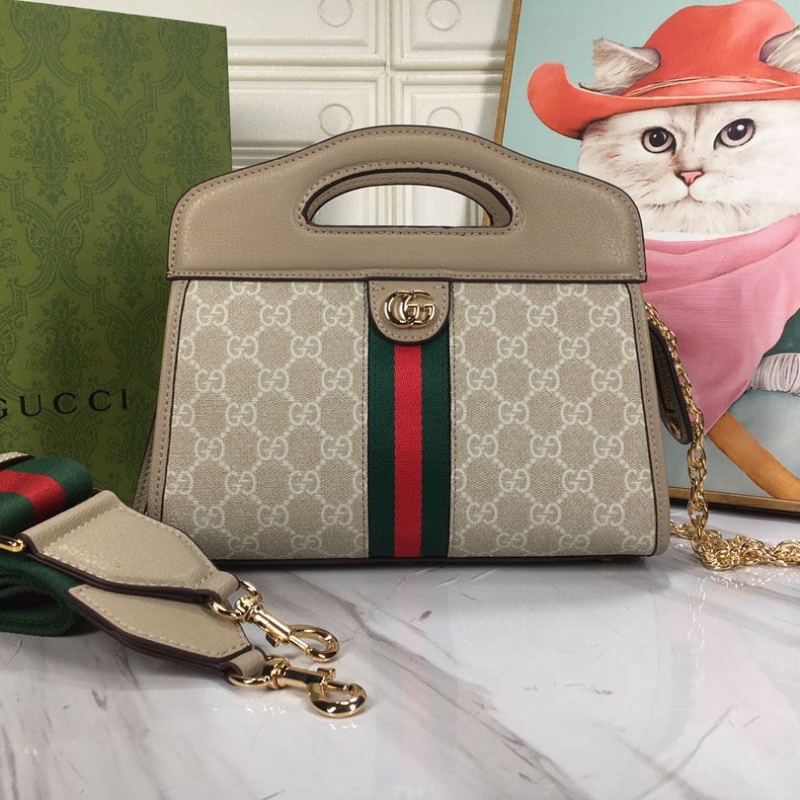 G*u*i top handle bags